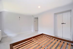 Principal bedroom with walk-in wardrobe- click for photo gallery